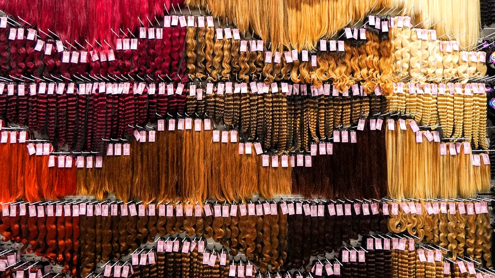 Bundles and extensions wall at Nova Beauty Supply on Bearss Avenue
