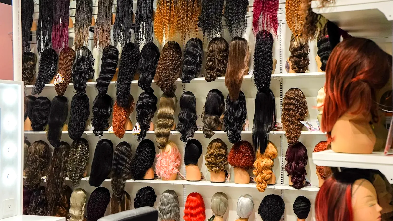 Nova Beauty Supply wig wall and vanity setup